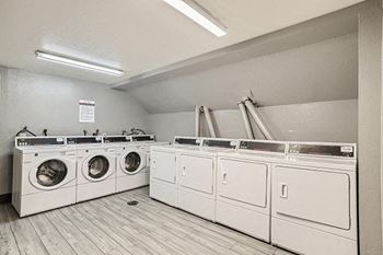 a washer and dryer in a laundromat